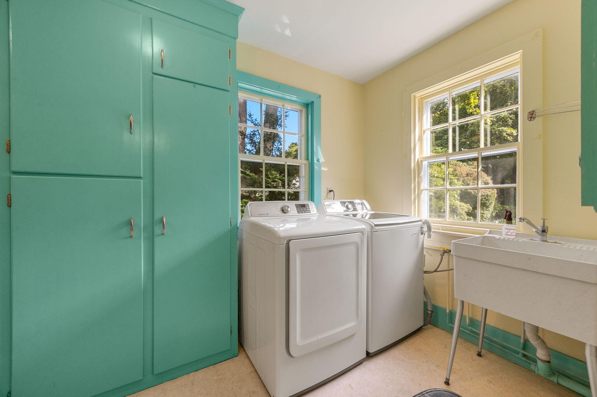 188 Oceanview Avenue Cotuit, MA 02635 - Photo 13 of 76 a utility room with dryer and washer