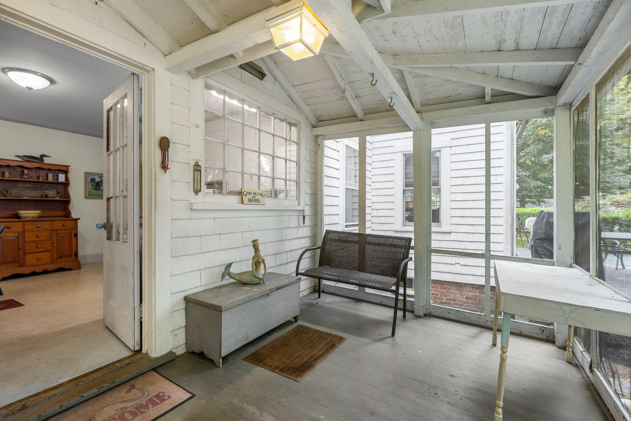 188 Oceanview Avenue Cotuit, MA 02635 - Photo 14 of 76 a living room with furniture and a fireplace