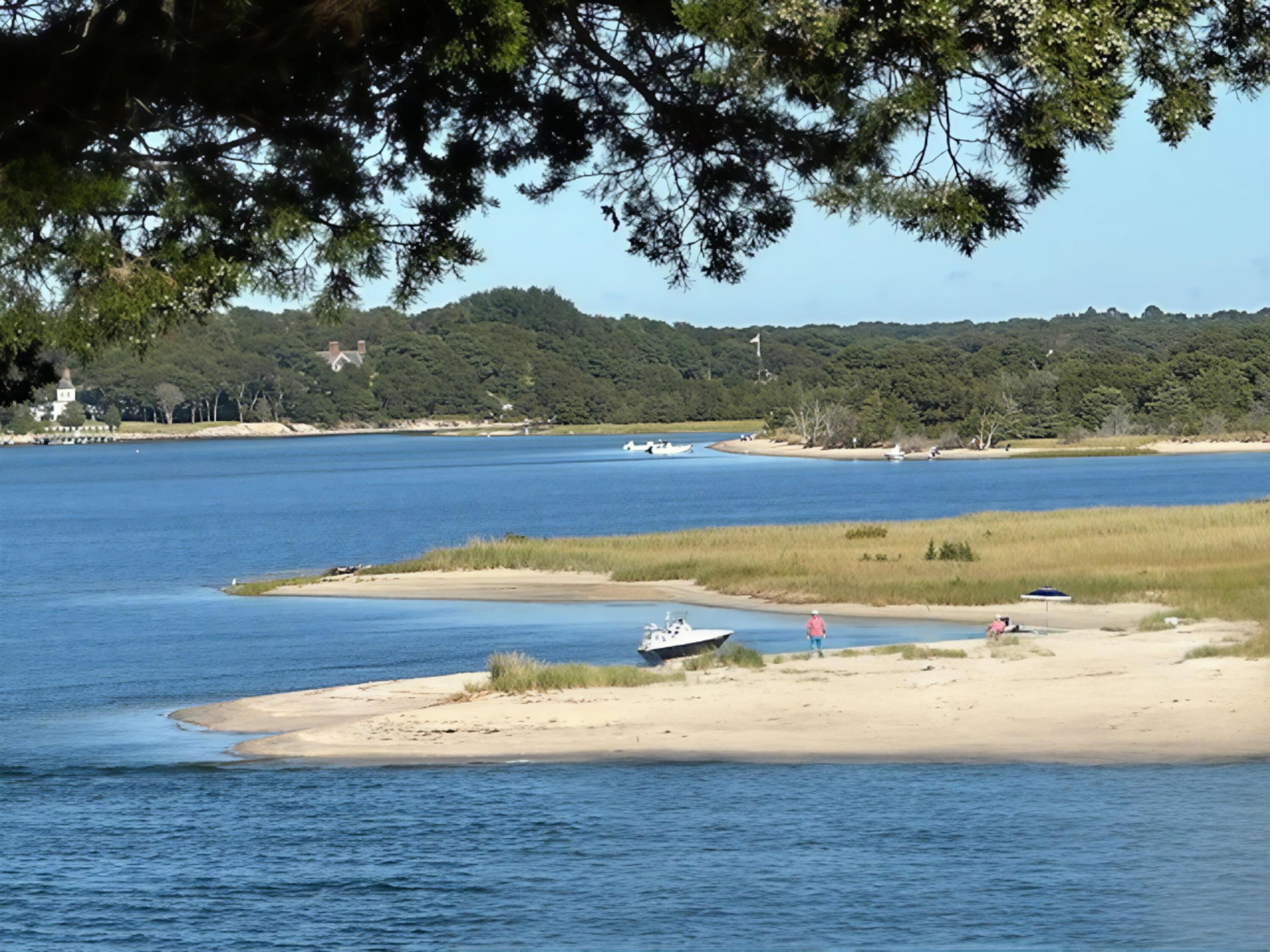 188 Oceanview Avenue Cotuit, MA 02635 - Photo 2 of 76 a view of an ocean and a mountain