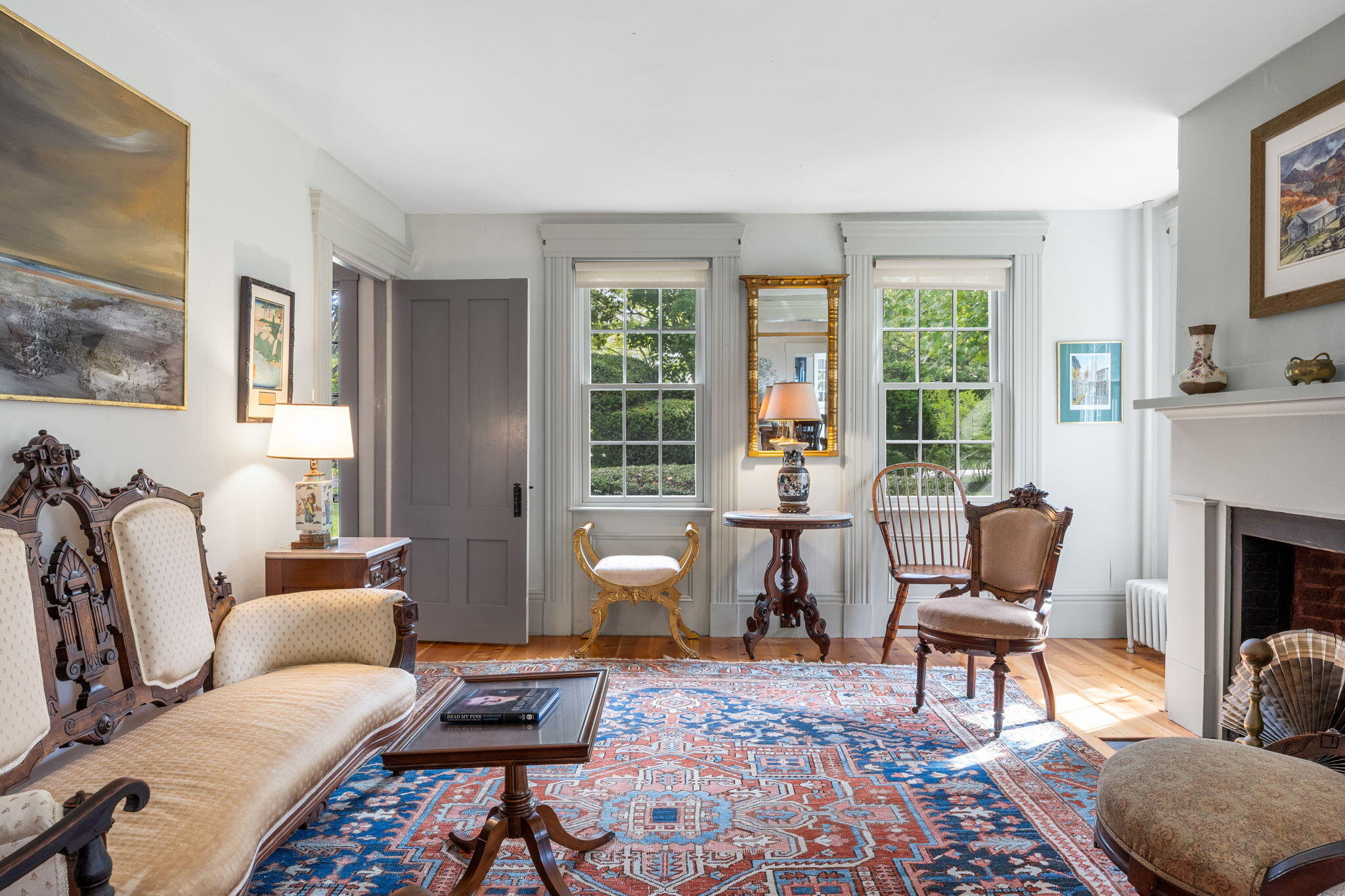 188 Oceanview Avenue Cotuit, MA 02635 - Photo 26 of 76 a living room with furniture and a fireplace