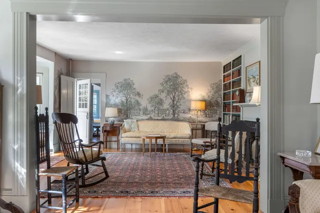 a bedroom with a bed and a fireplace