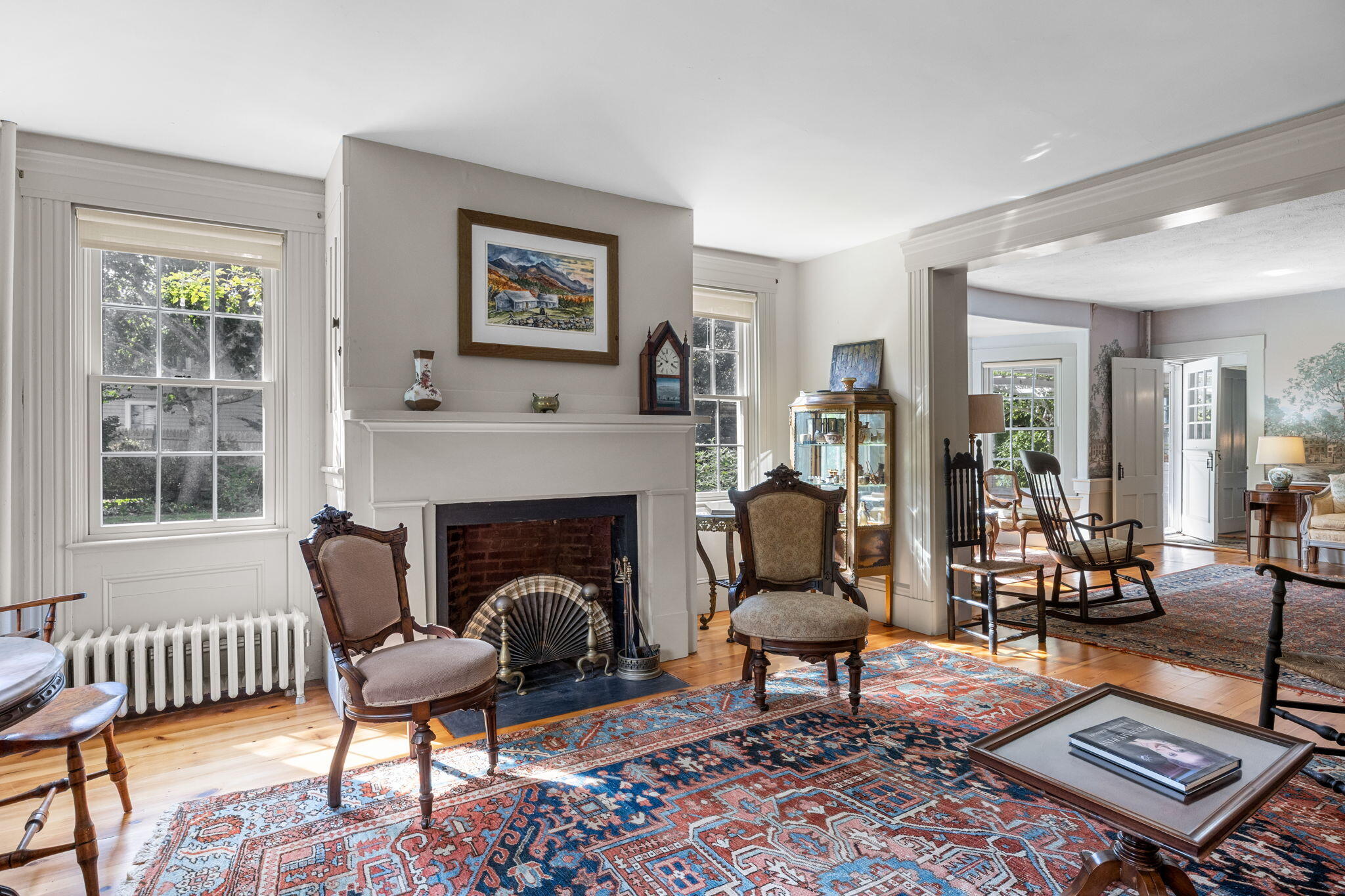 188 Oceanview Avenue Cotuit, MA 02635 - Photo 28 of 76 a living room with furniture and a fireplace
