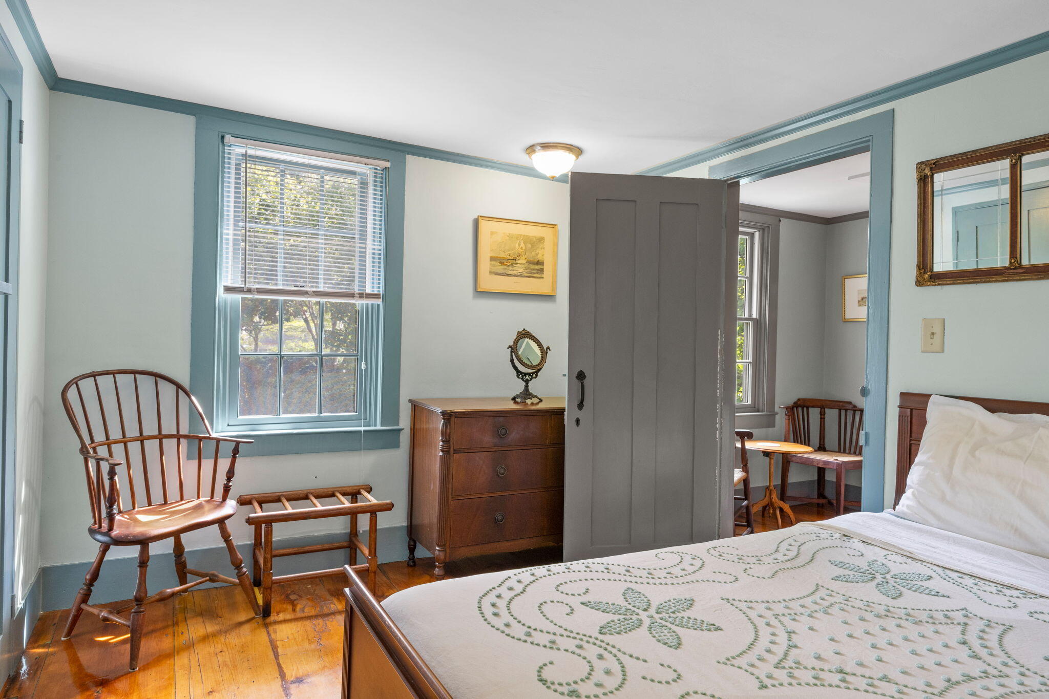 188 Oceanview Avenue Cotuit, MA 02635 - Photo 37 of 76 a bedroom with a bed and wooden floor