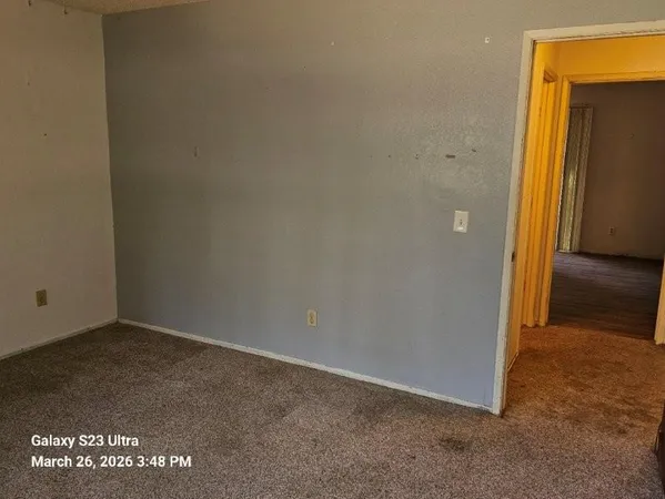 an empty room with an entryway