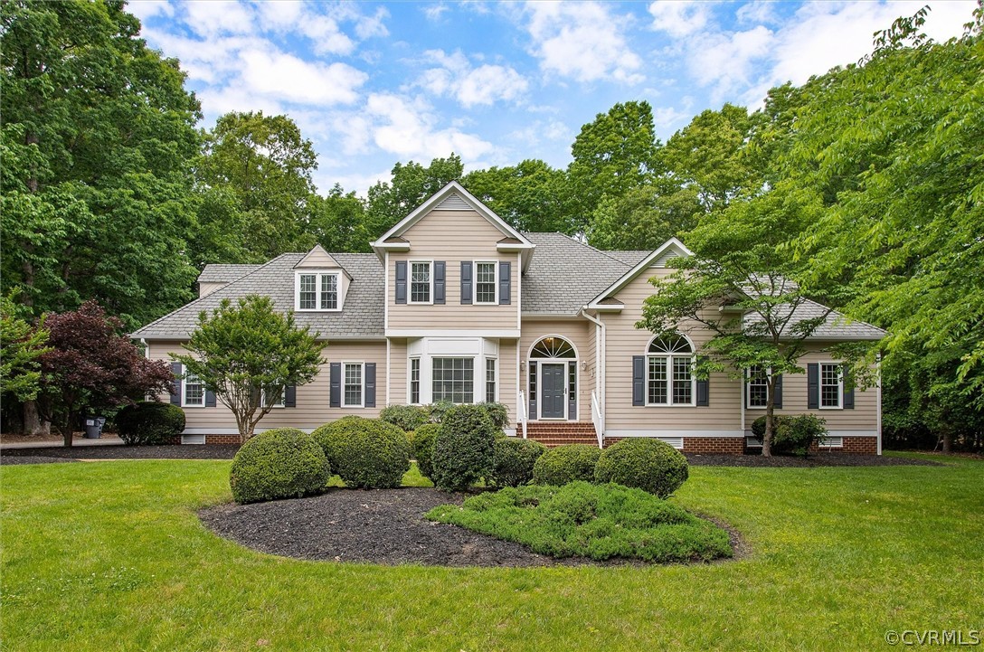 14200 Leafield Drive Midlothian, VA 23113 - Photo 1 of 48 a front view of a house with a garden