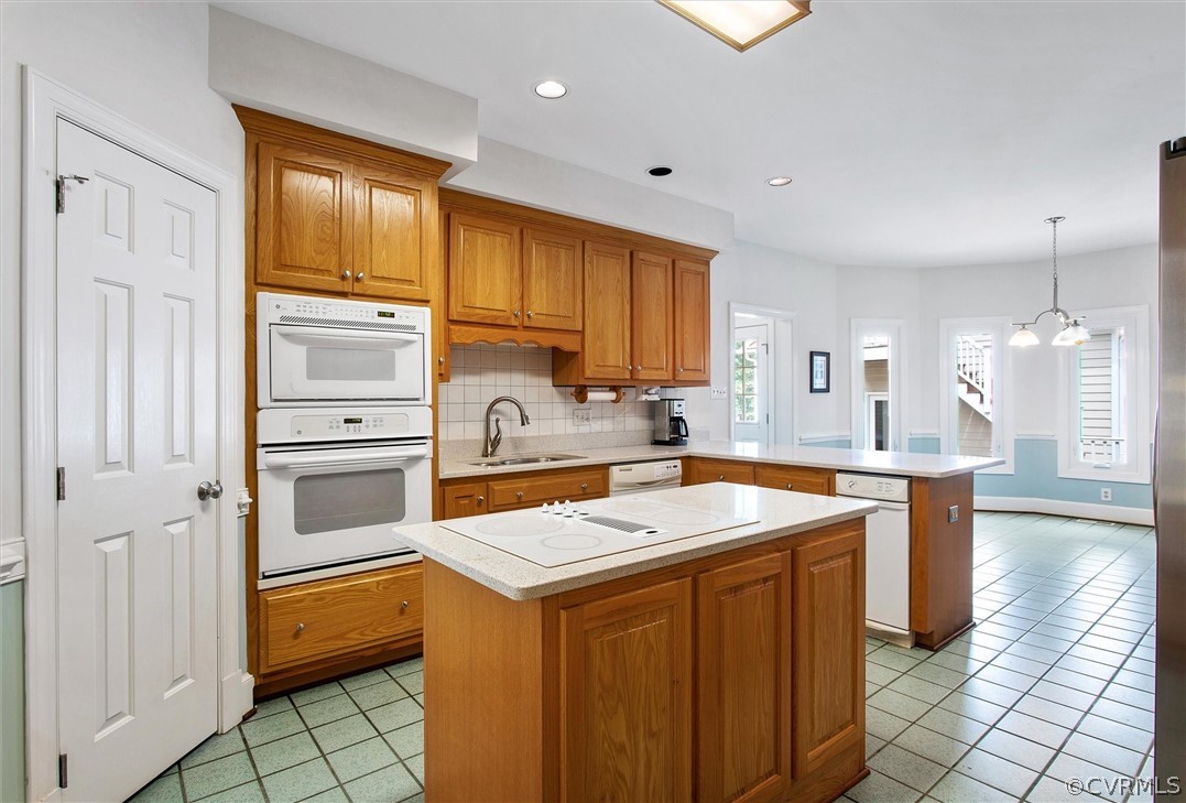 14200 Leafield Drive Midlothian, VA 23113 - Photo 12 of 48 a kitchen with a sink stove and cabinets