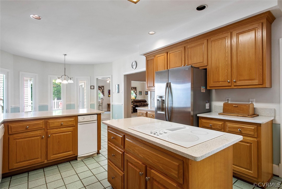 14200 Leafield Drive Midlothian, VA 23113 - Photo 13 of 48 a kitchen with a stove a refrigerator and a sink