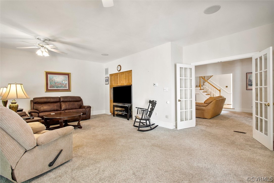 14200 Leafield Drive Midlothian, VA 23113 - Photo 22 of 48 a living room with furniture and a flat screen tv