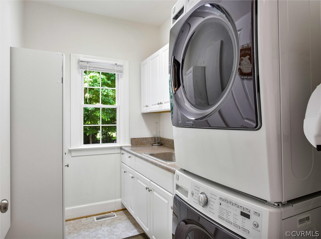 14200 Leafield Drive Midlothian, VA 23113 - Photo 23 of 48 a close view of a utility room with washer and dryer