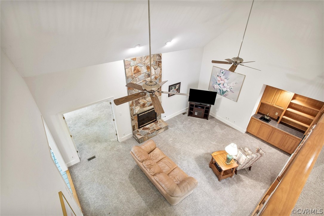 14200 Leafield Drive Midlothian, VA 23113 - Photo 32 of 48 a living room with furniture and a flat screen tv