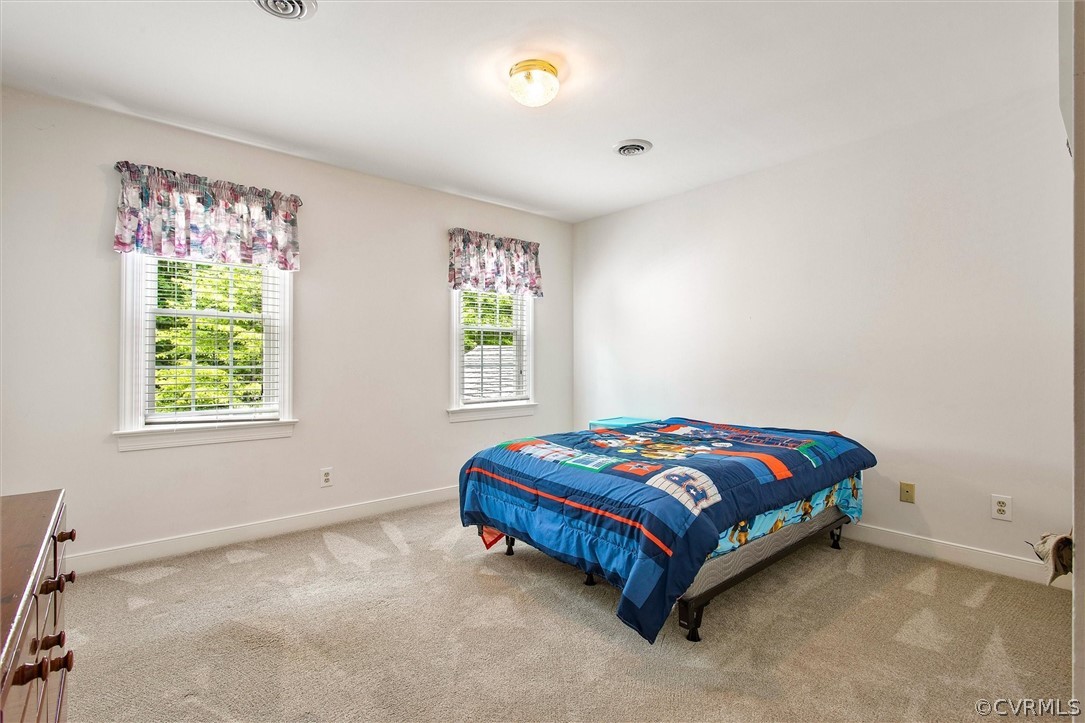 14200 Leafield Drive Midlothian, VA 23113 - Photo 34 of 48 a bedroom with a bed and a window