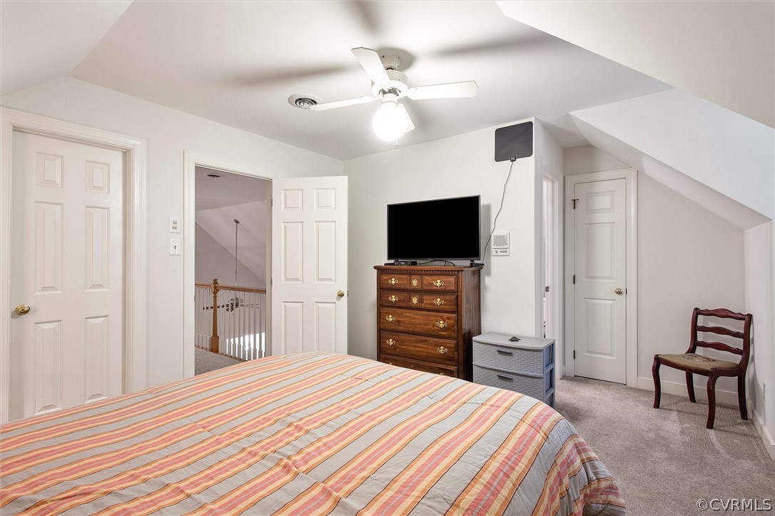 14200 Leafield Drive Midlothian, VA 23113 - Photo 39 of 48 a bedroom with a bed and a flat screen tv