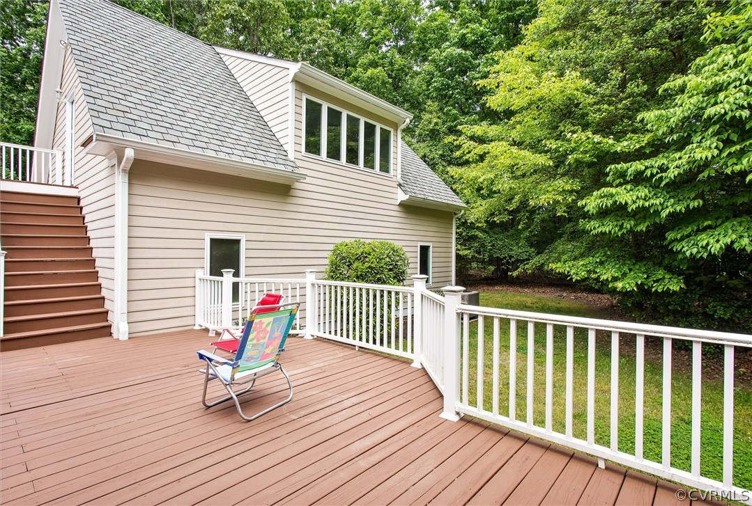 14200 Leafield Drive Midlothian, VA 23113 - Photo 42 of 48 a balcony with wooden floor table and chairs