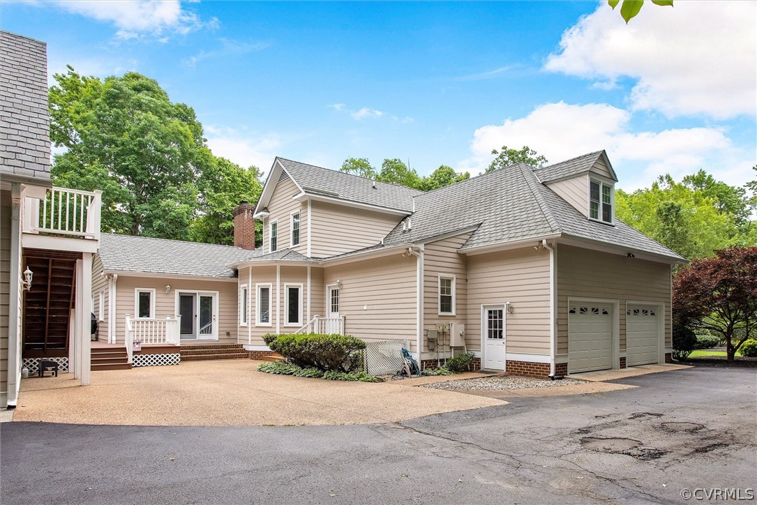14200 Leafield Drive Midlothian, VA 23113 - Photo 48 of 48 a front view of a house with a garden