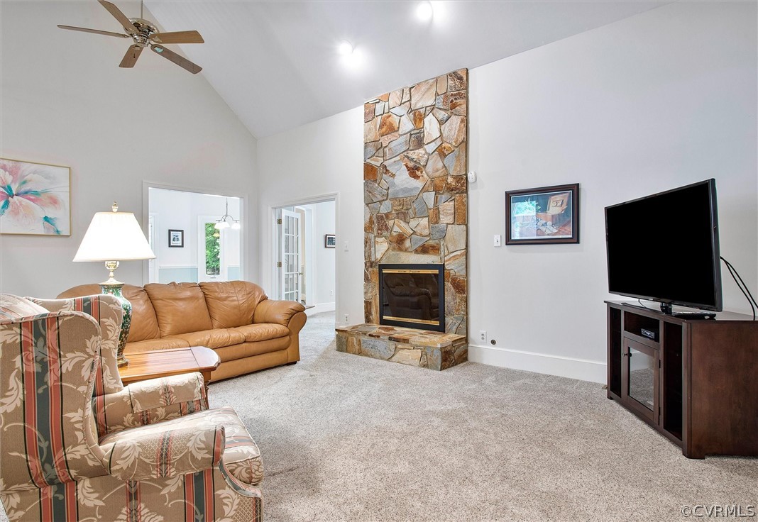 14200 Leafield Drive Midlothian, VA 23113 - Photo 9 of 48 a living room with furniture and a flat screen tv