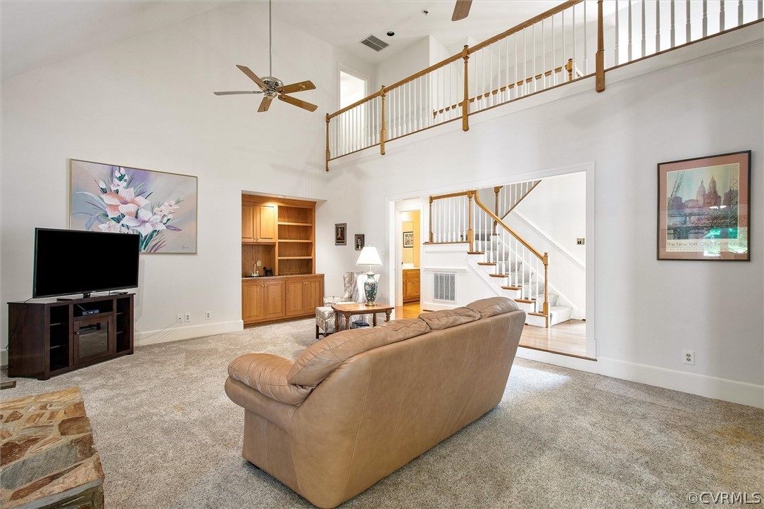 14200 Leafield Drive Midlothian, VA 23113 - Photo 10 of 48 a living room with furniture and a flat screen tv