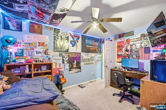 a bed room with a bed and a window