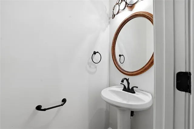 a balcony with wooden floor and fence