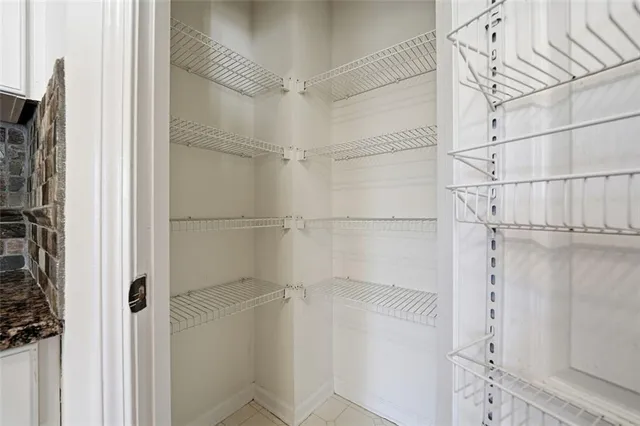 a aerial view of a house with a yard and garden