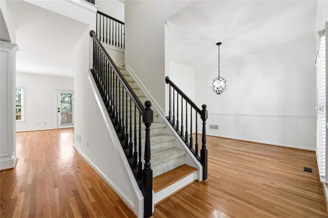 a view of entryway with wooden floor