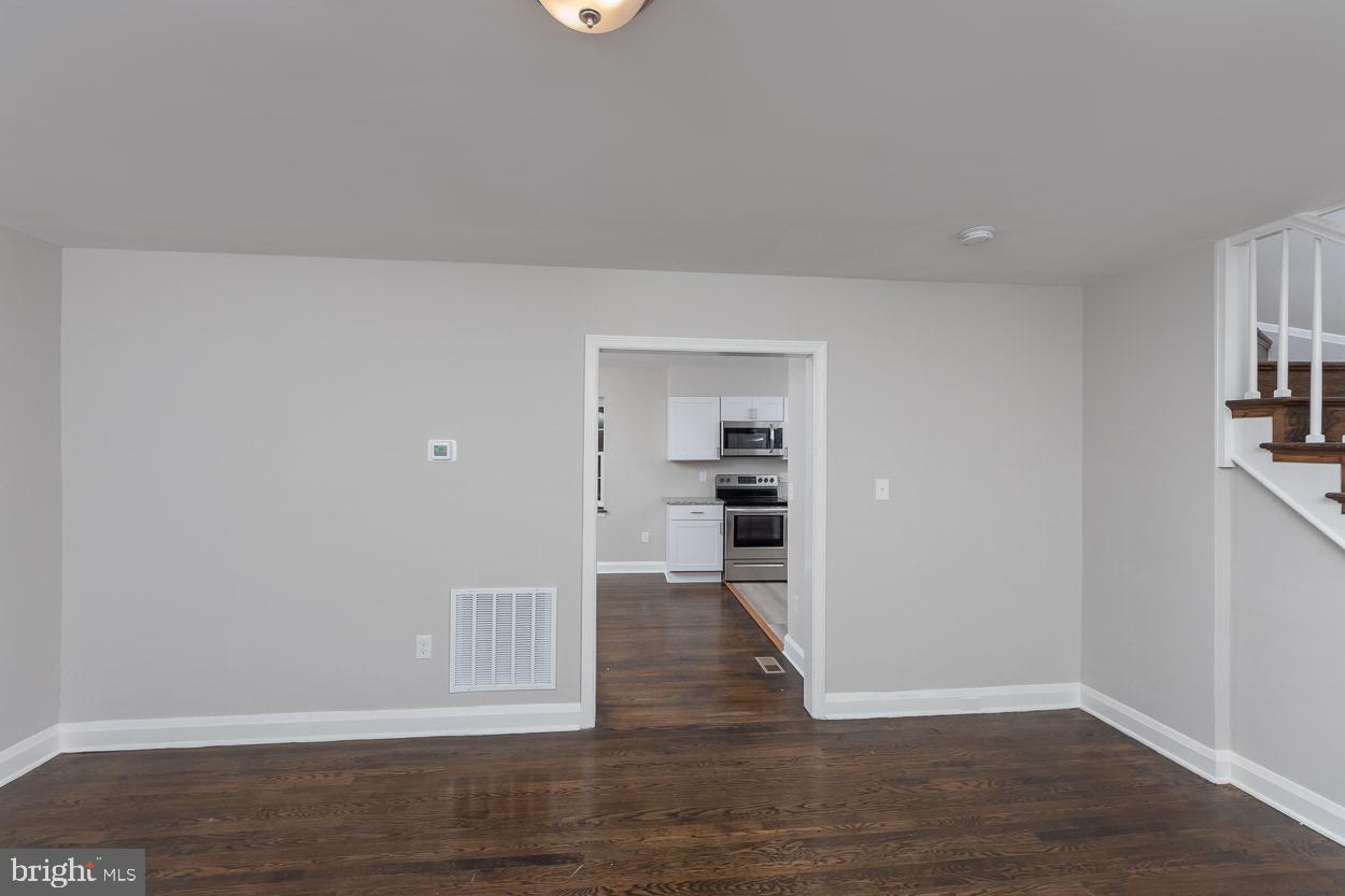 5318 Plymouth Road Baltimore, MD 21214 - Photo 19 of 50 View of Living Room into Kitchen