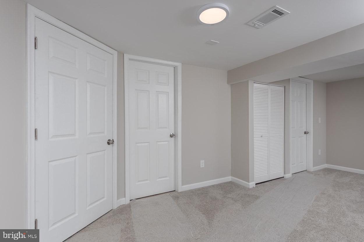 5318 Plymouth Road Baltimore, MD 21214 - Photo 45 of 50 New Plush Carpeting in Family Room