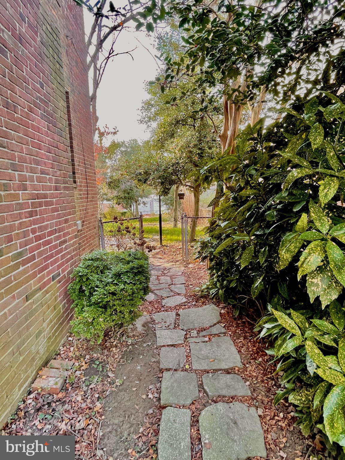 5318 Plymouth Road Baltimore, MD 21214 - Photo 9 of 50 Flagstone Walkway leads to enchanting backyard