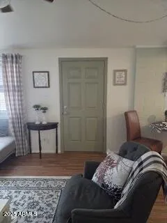 a bedroom with a bed and a table in it