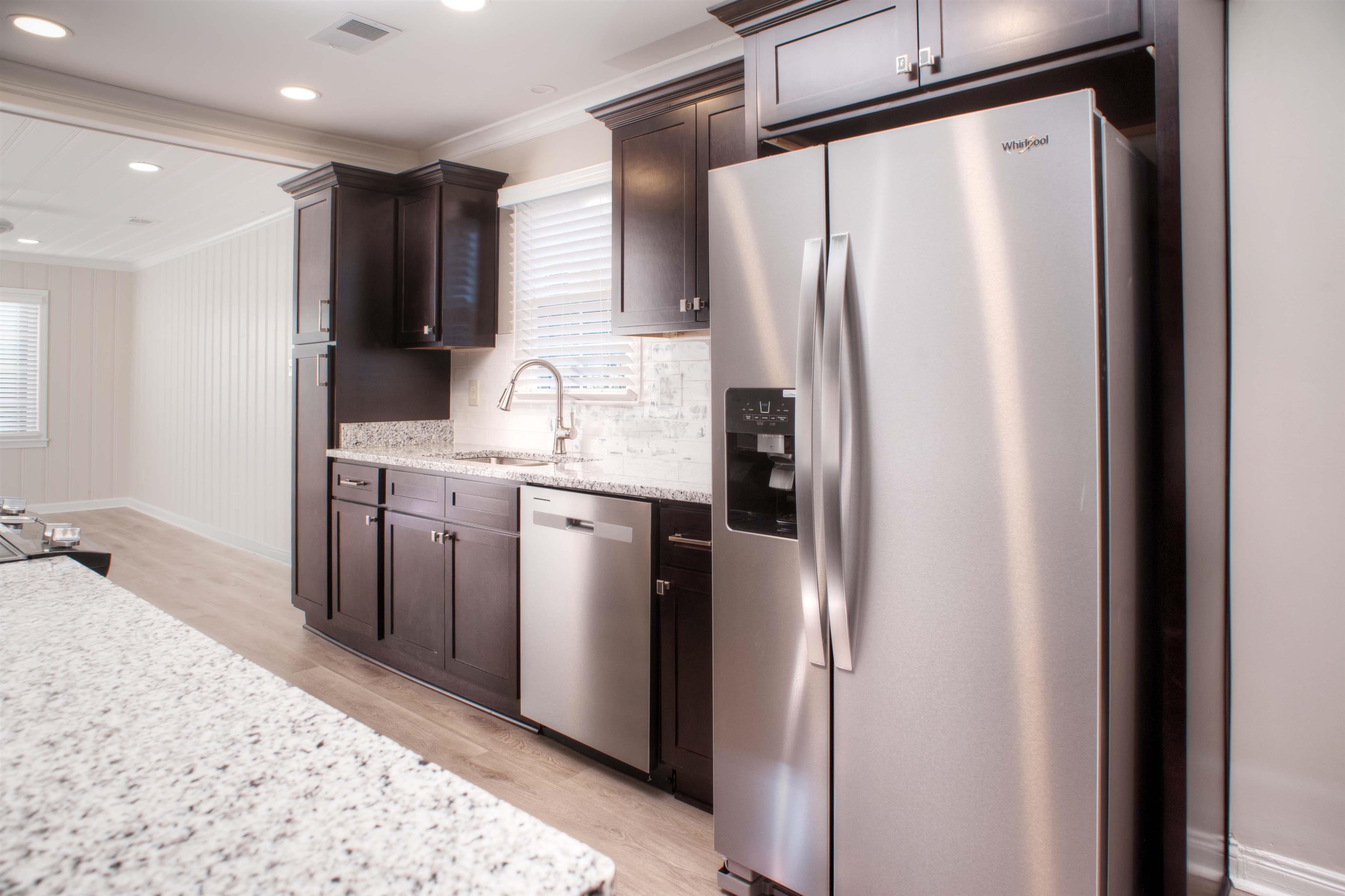 3795 Gamewell Road Memphis, TN 38111 - Photo 5 of 20 a kitchen with stainless steel appliances a refrigerator and a sink