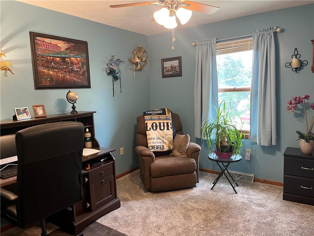 101 Dolphin Drive Butler, PA 16002 - Photo 19 of 27 a livingroom with workspace and a window