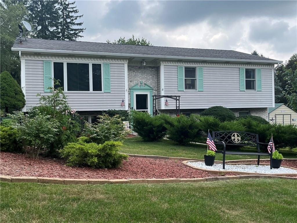 101 Dolphin Drive Butler, PA 16002 - Photo 2 of 27 a front view of a house with a yard