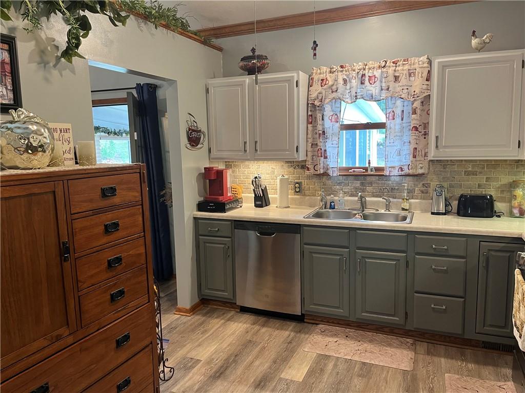 101 Dolphin Drive Butler, PA 16002 - Photo 25 of 27 a kitchen with a sink window and cabinets