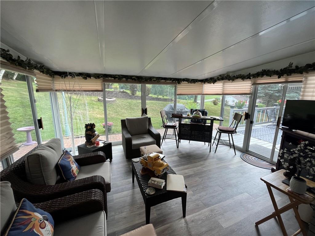 101 Dolphin Drive Butler, PA 16002 - Photo 27 of 27 a living room with furniture and large windows