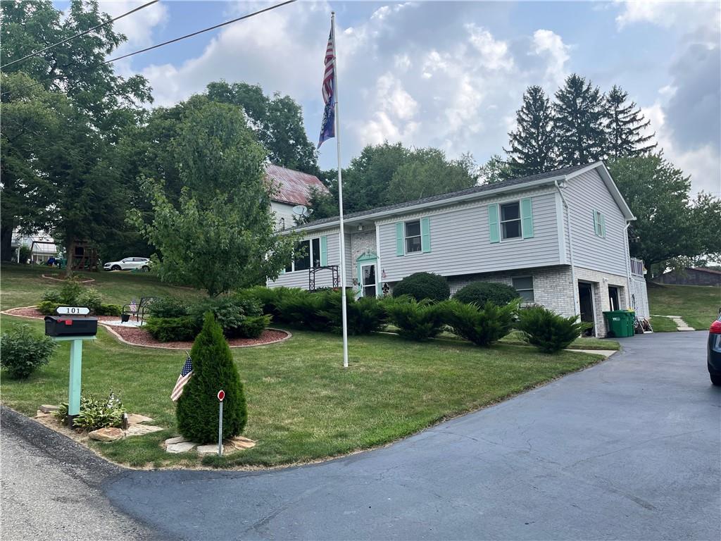 101 Dolphin Drive Butler, PA 16002 - Photo 4 of 27 a view of a house with backyard and garden