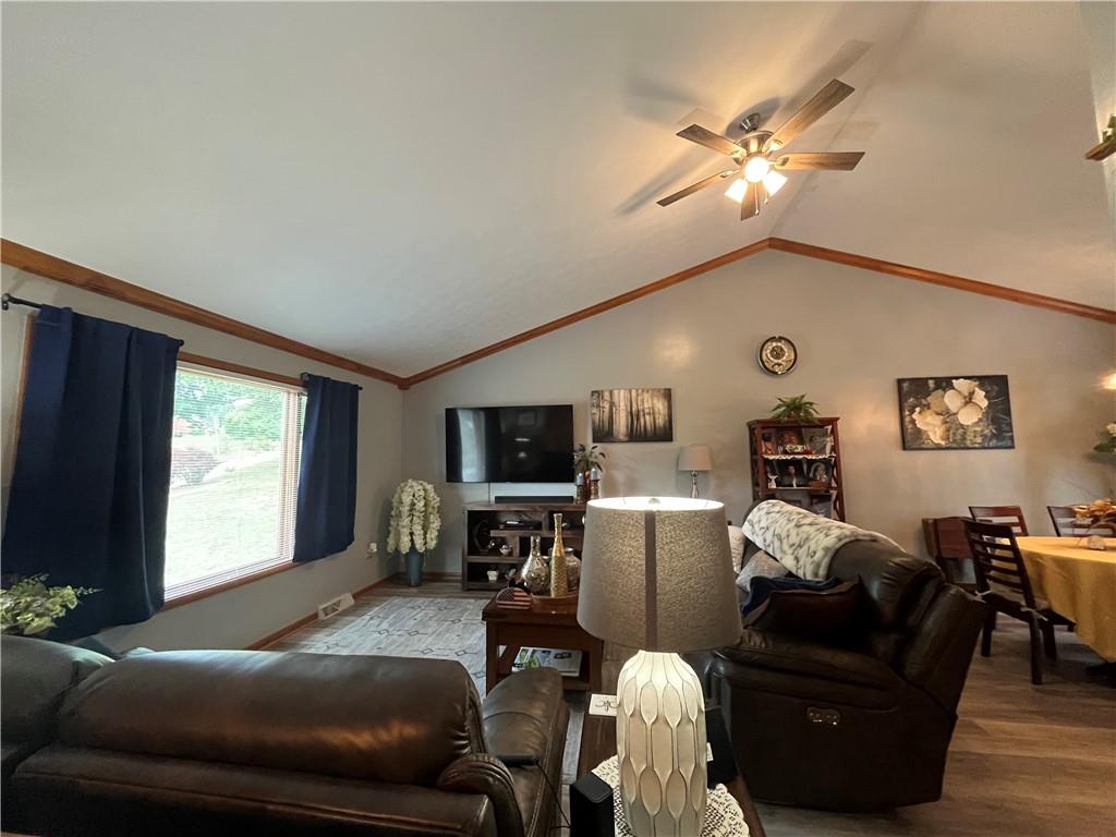 101 Dolphin Drive Butler, PA 16002 - Photo 5 of 27 a living room with furniture and a flat screen tv
