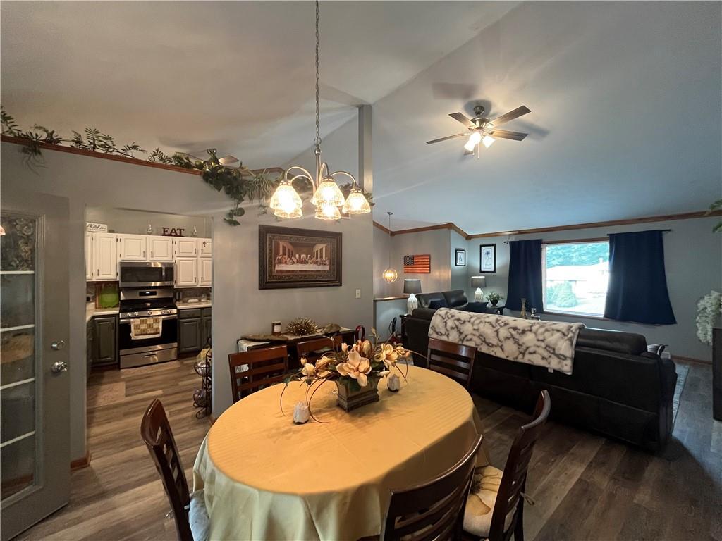 101 Dolphin Drive Butler, PA 16002 - Photo 8 of 27 a view of a dining room with furniture and chandelier