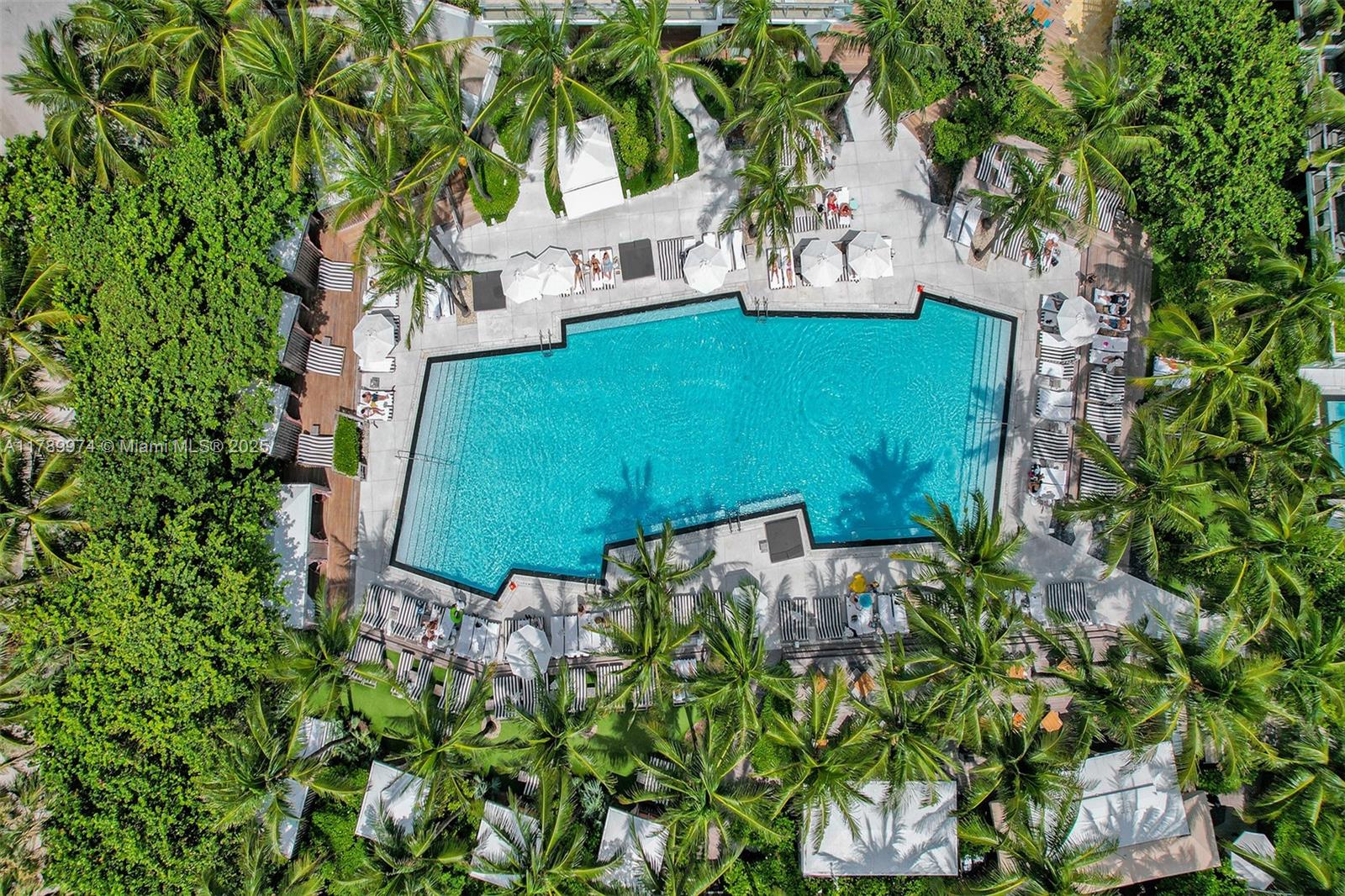 2201 Collins Avenue, Unit 1215 Miami Beach, FL 33139 - Photo 13 of 15 an aerial view of a house with a yard