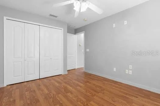 a kitchen with stainless steel appliances granite countertop a refrigerator stove top oven and sink