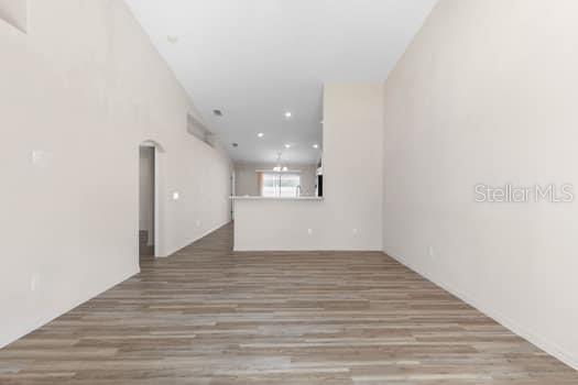 28 Karat Path Palm Coast, FL 32164 - Photo 41 of 75 a view of a hallway with wooden floor and a large window