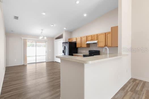 28 Karat Path Palm Coast, FL 32164 - Photo 43 of 75 a kitchen with stainless steel appliances a refrigerator and a stove top oven