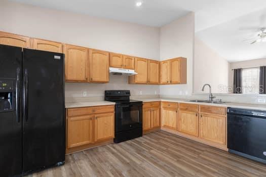 28 Karat Path Palm Coast, FL 32164 - Photo 45 of 75 a kitchen with stainless steel appliances granite countertop a refrigerator stove top oven and sink