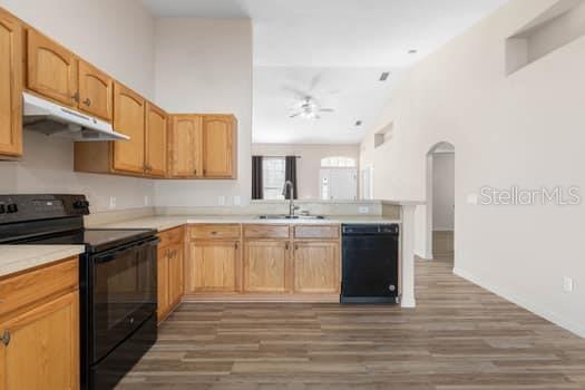 28 Karat Path Palm Coast, FL 32164 - Photo 47 of 75 a large kitchen with stainless steel appliances granite countertop a sink and cabinets