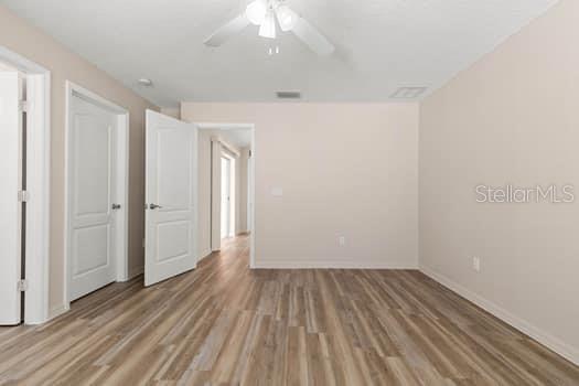 28 Karat Path Palm Coast, FL 32164 - Photo 50 of 75 wooden floor in an empty room with a window
