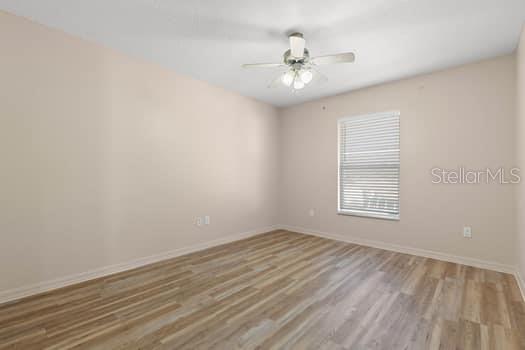 28 Karat Path Palm Coast, FL 32164 - Photo 53 of 75 wooden floor in an empty room with a window