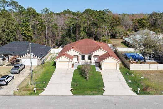 28 Karat Path Palm Coast, FL 32164 - Photo 66 of 75 an aerial view of a house