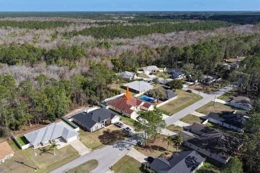 28 Karat Path Palm Coast, FL 32164 - Photo 70 of 75 an aerial view of a house with a yard
