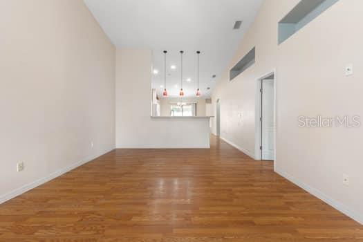 28 Karat Path Palm Coast, FL 32164 - Photo 7 of 75 a view of a kitchen with granite countertop cabinets and wooden floor
