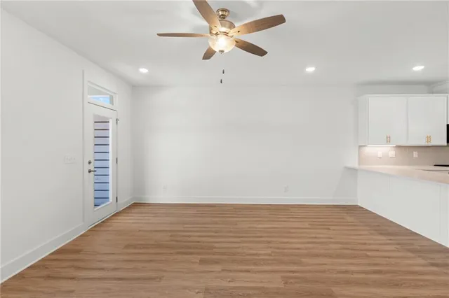 a view of kitchen with cabinets