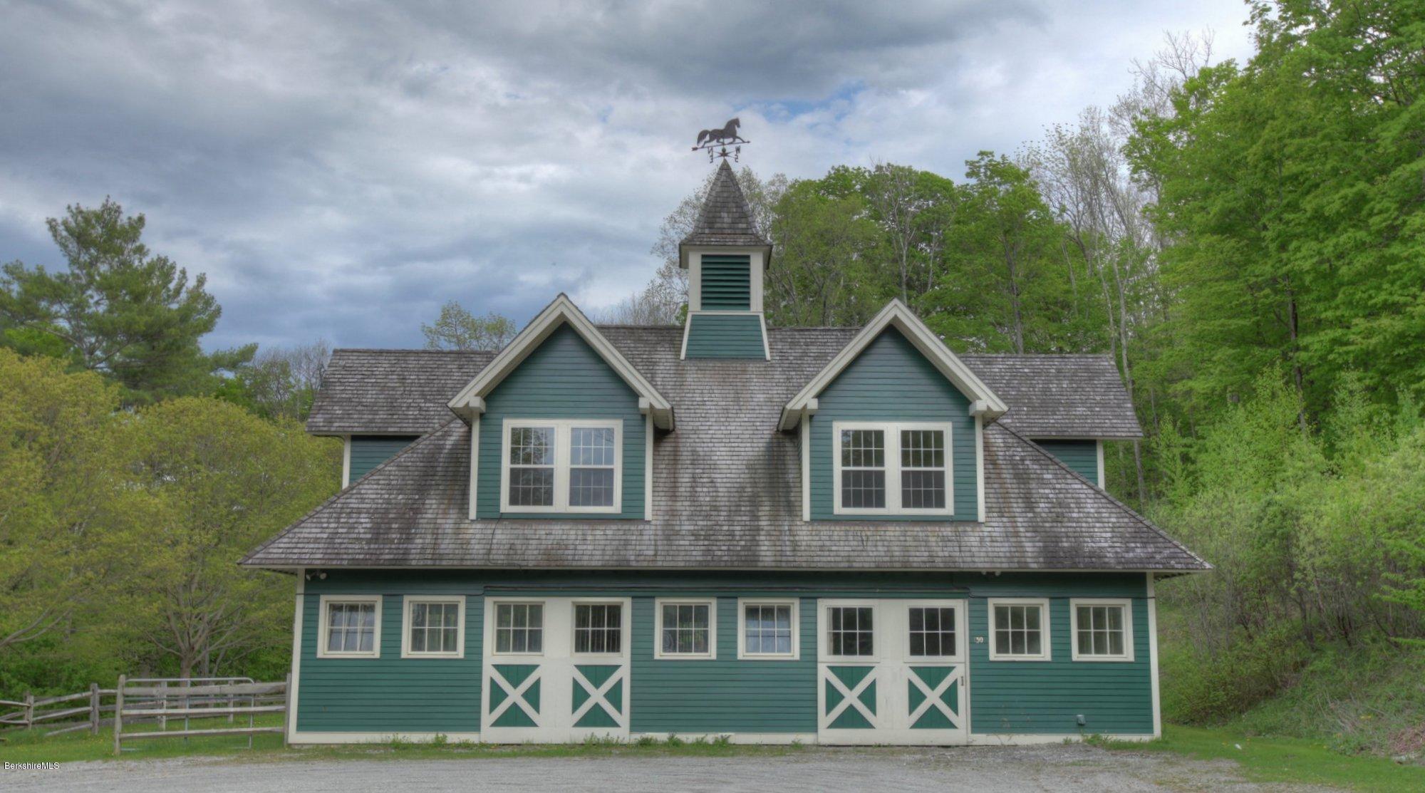 130 Jerusalem Road Tyringham, MA 01264 - Photo 1 of 15 a front view of a house with garden