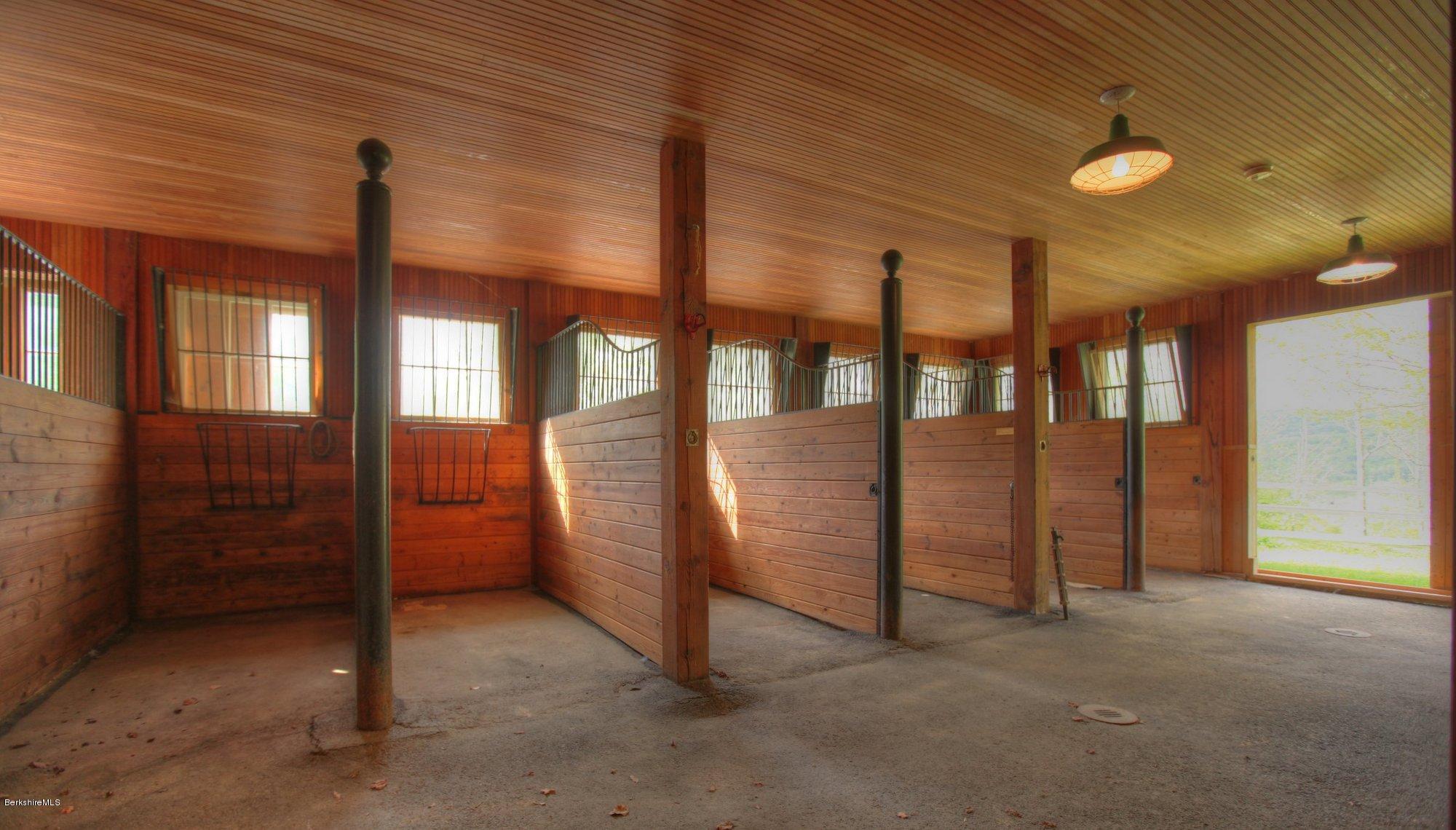 130 Jerusalem Road Tyringham, MA 01264 - Photo 9 of 15 a view of a hallway with windows